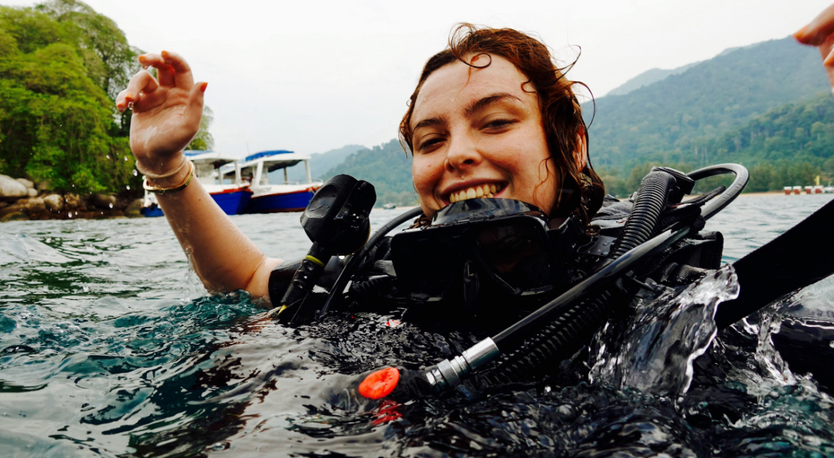 Leni surfacing in scuba gear
